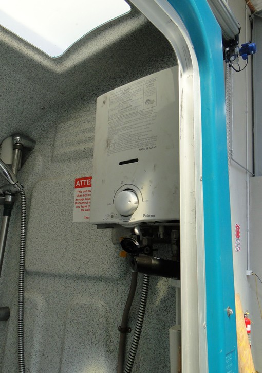 [image] Water heater inside portable shower unit