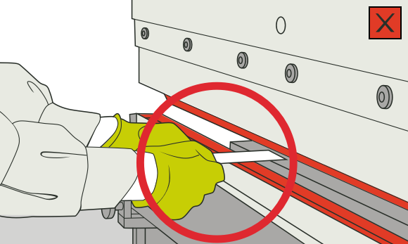 [image] Unguarded brake press showing worker's gloved hands operating too close to the hazardous trapping space