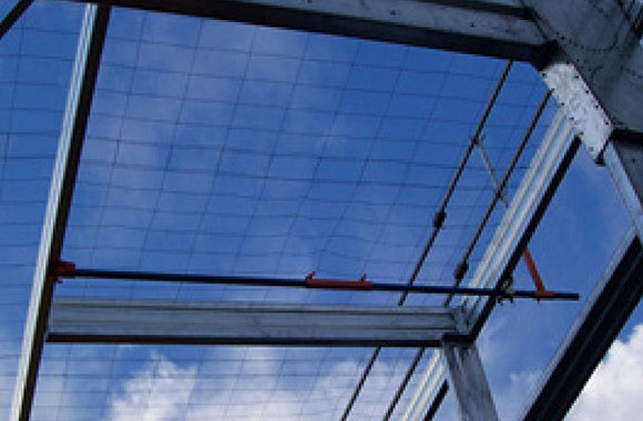 [image] Safety mesh installed over roof frame