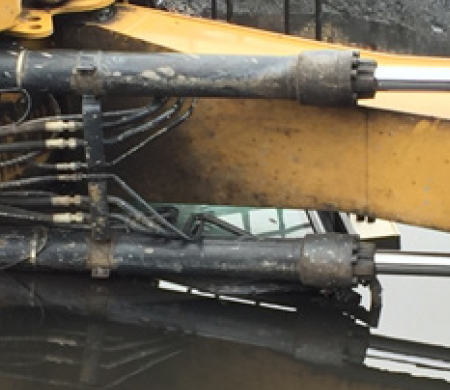 [image] Close up of excavator cab almost submerged