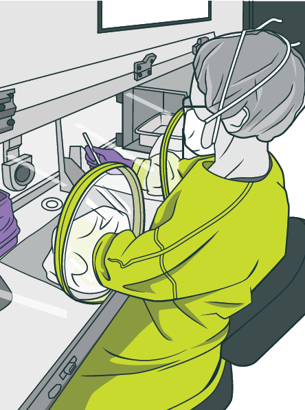 [image] pharmacy technician using an isolator to prepare cytotoxic drugs. 